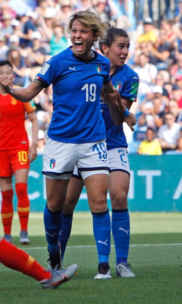 Italy beats China 2-0, reaches first quarterfinal since 1991